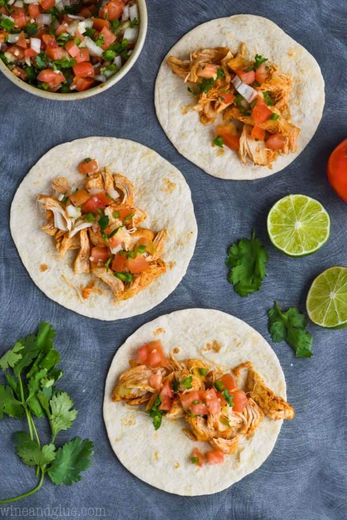 overhead view of three chicken tacos made in the instant pot