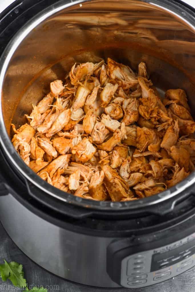 overhead view of taco chicken in instant pot