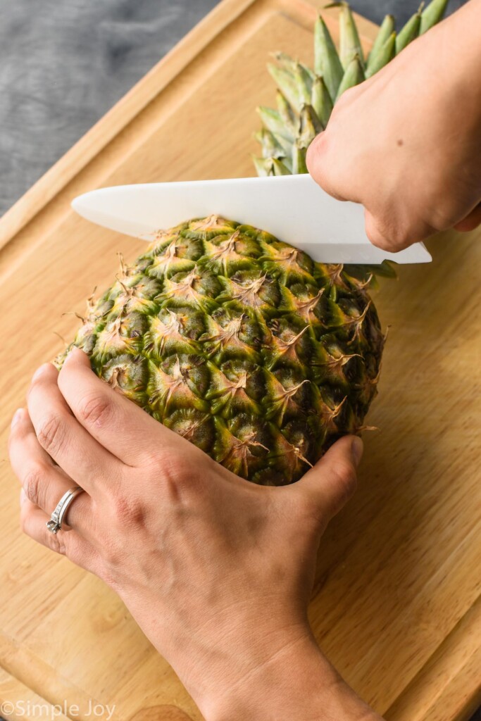a pineapple with the top being cut off