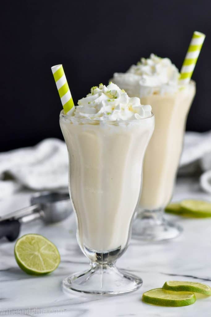 two boozy margarita milkshakes in tall shake glasses