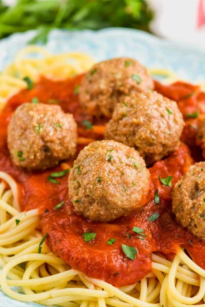 healthy turkey meatballs on sauce over spaghetti