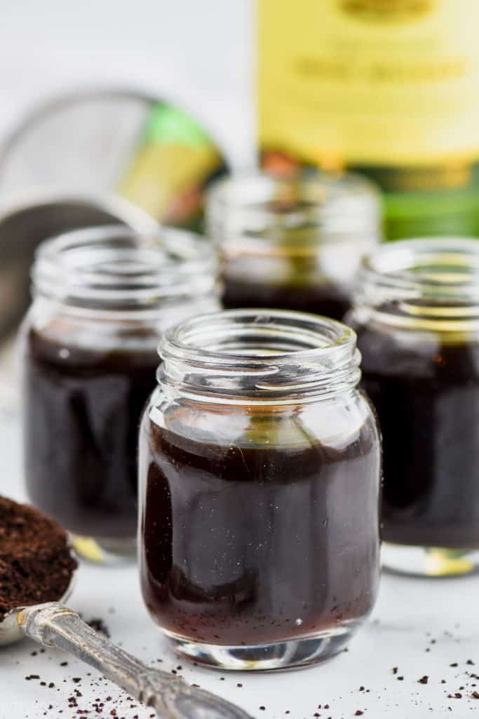 irish coffee shots in mason jar shot glasses before being topped with whipped cream
