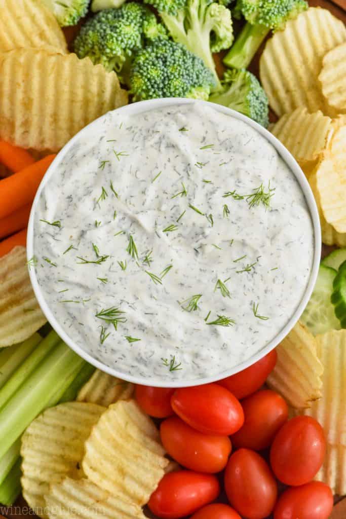 over head of dill vegetable dip recipe with chips and vegetables