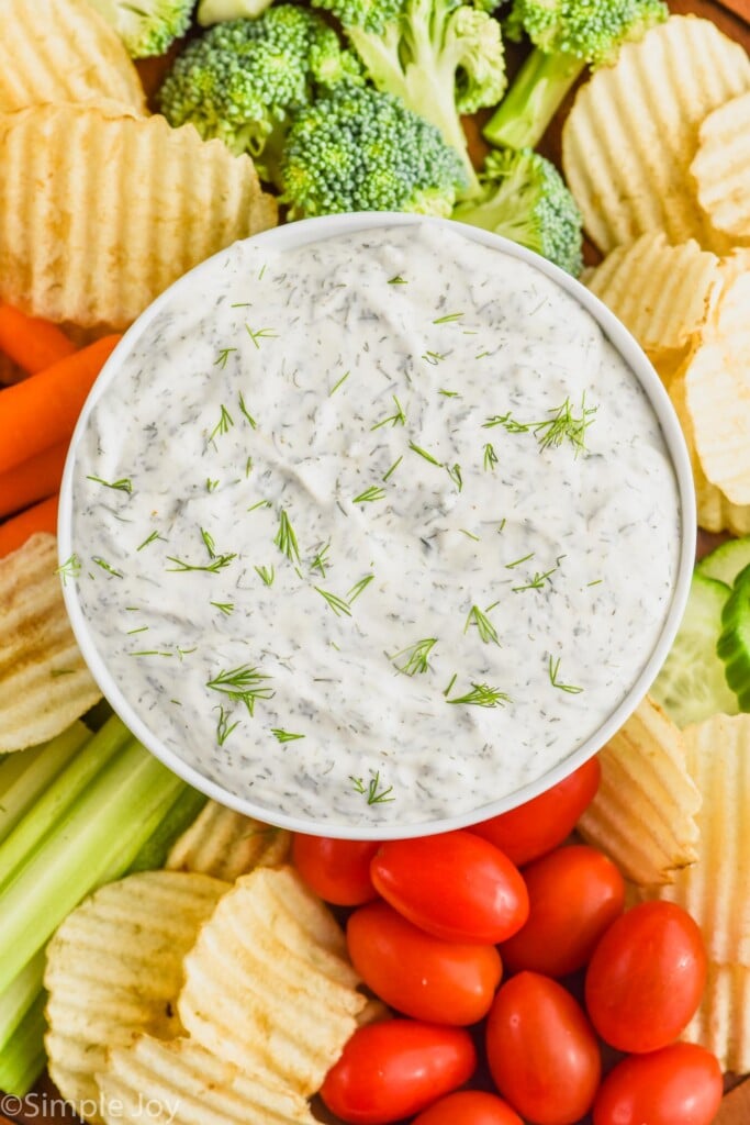 over head of dill vegetable dip recipe with chips and vegetables