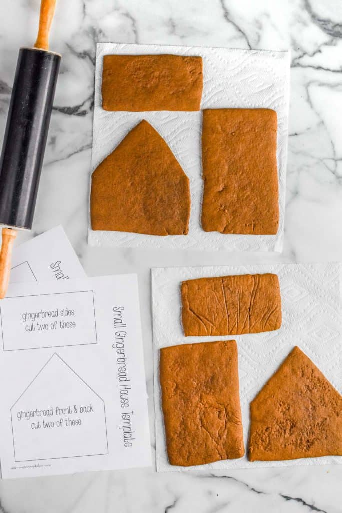pieces of gingerbread house drying on paper towels