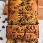 chocolate chip banana bread sliced on a cutting board