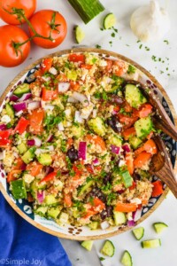 overhead view of Mediterranean quinoa in a wood bowl