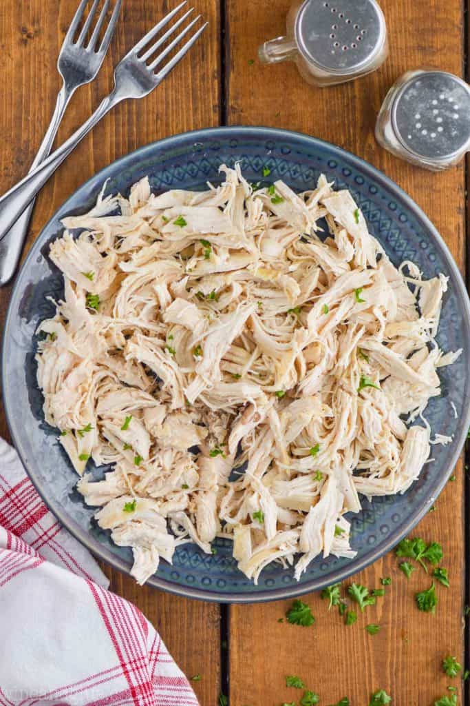 instant pot chicken breast recipe shredded on a plate