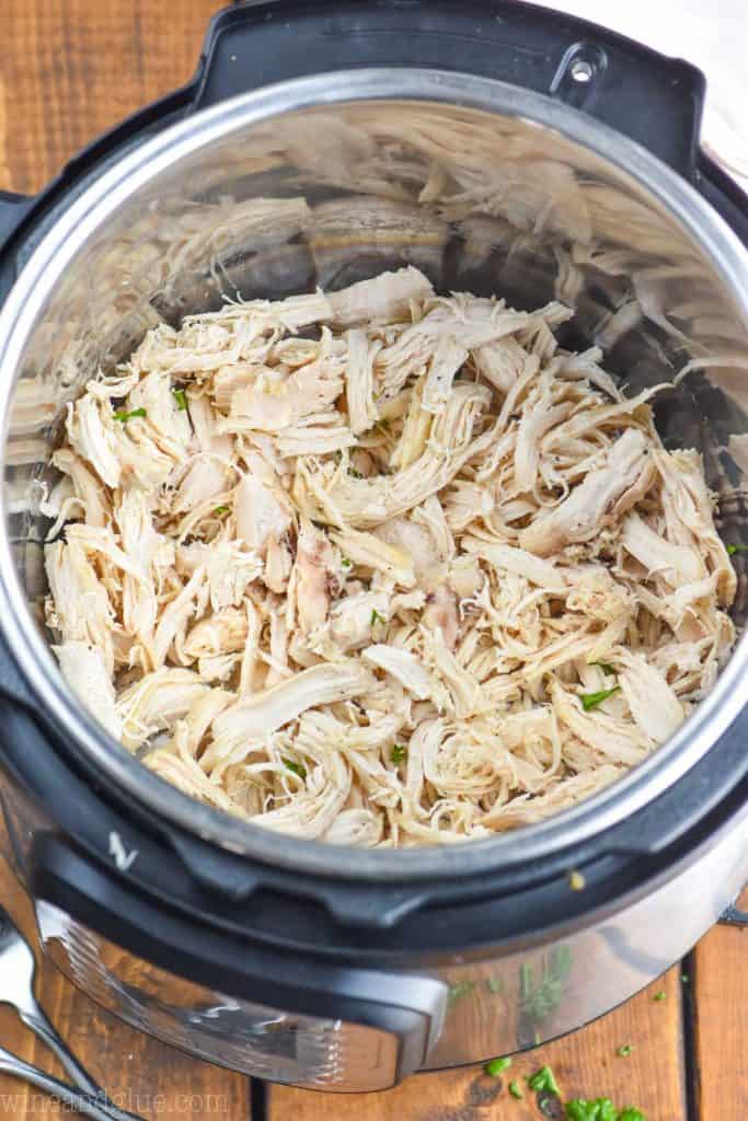 instant pot shredded chicken recipe inside of a pressure cooker