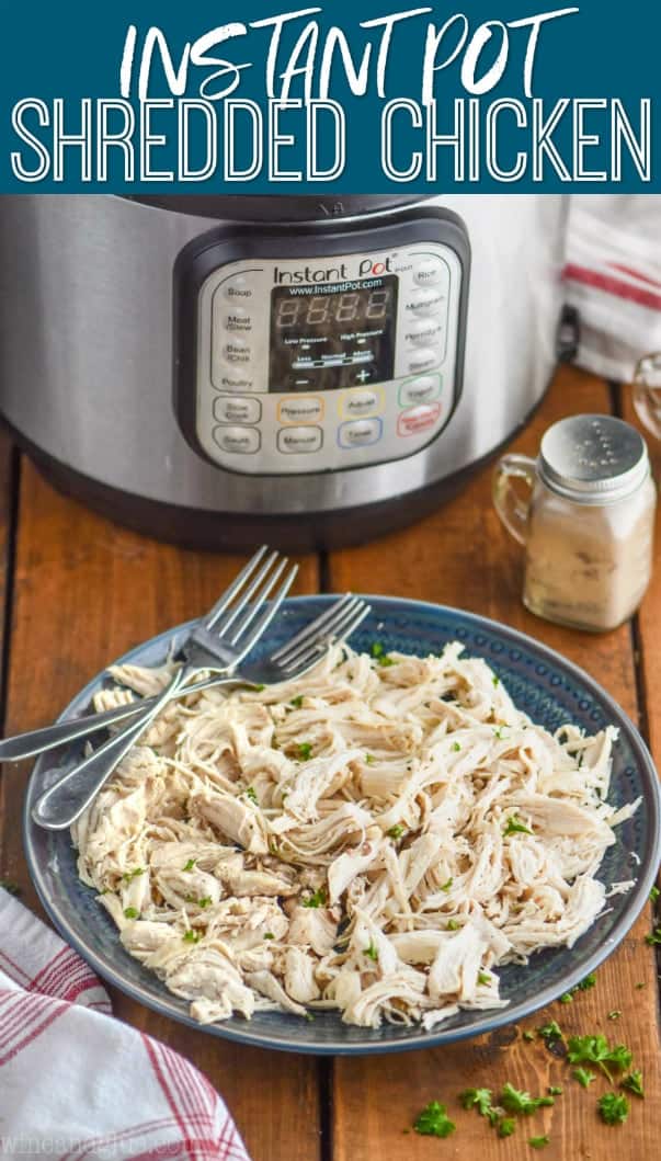 shredded instant pot chicken on a plate in front of an instant pot