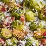 up close of roasted brussel sprouts with parmesan cheese and bacon