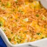 white casserole dish with chicken broccoli rice casserole