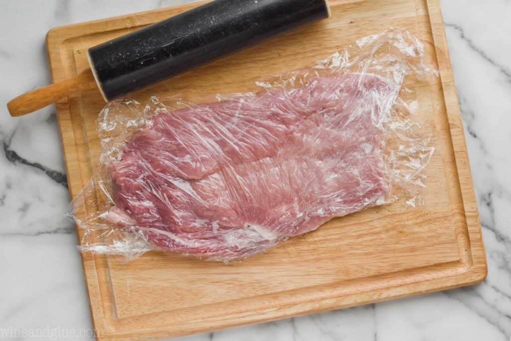 a pork loin that was butterflied and then flattened using a rolling pin
