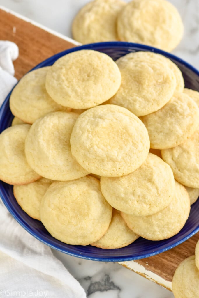 a plate stacked with the best sugar cookie recipe 