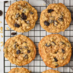 pinterest graphic of cookies on a cooling rack, says: "the best oatmeal raisin cookies simplejoy.com"