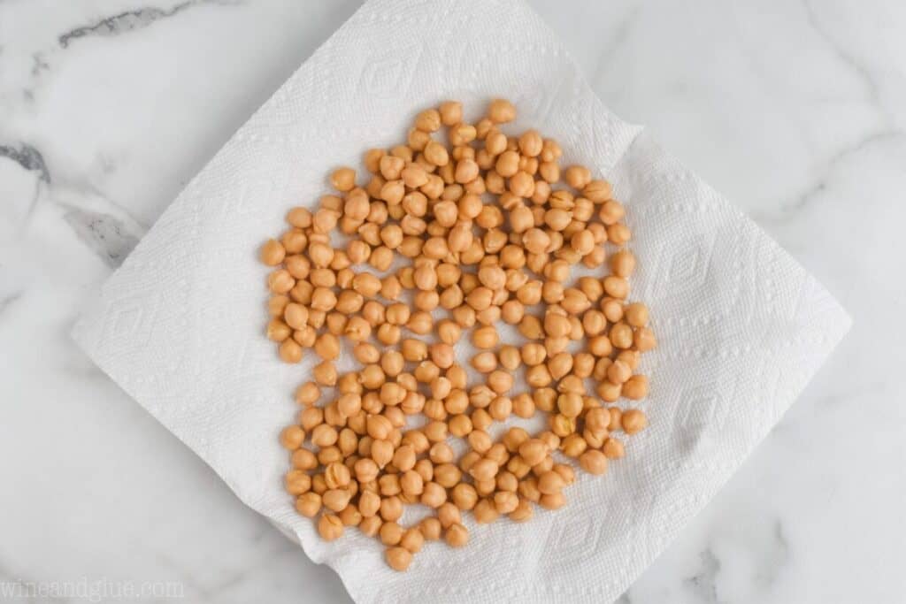 chickpeas that have been washed and dried on a paper towel