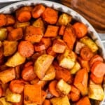 pinterest graphic of overhead view of a serving bowl full of roasted root vegetable recipe, says: delicious roasted root veggies simplejoy.com