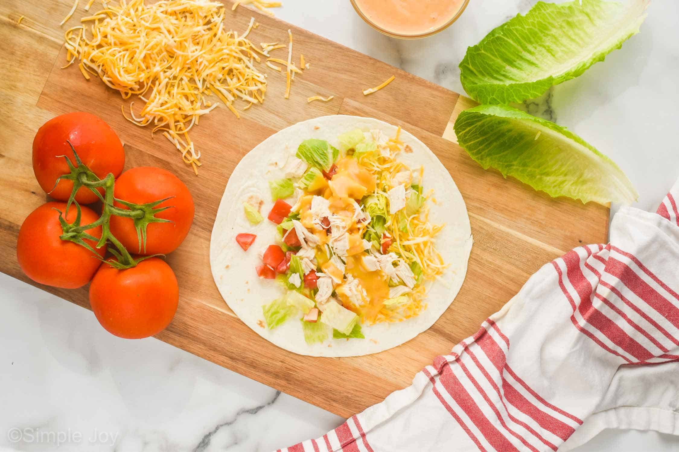 https://www.simplejoy.com/wp-content/uploads/2020/07/how-to-make-a-chicken-wrap.jpg