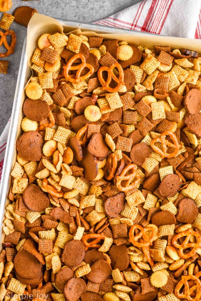 overhead view of a baking sheet of Chex mix recipe you make in the oven