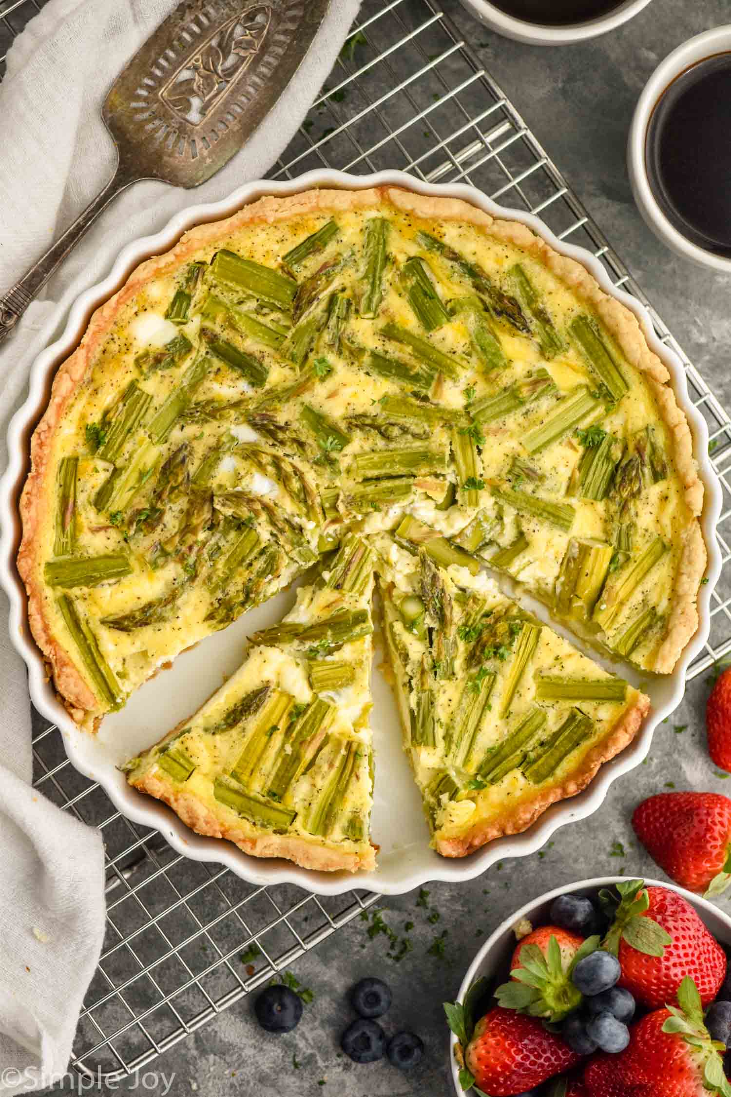 https://www.simplejoy.com/wp-content/uploads/2021/03/asparagus-quiche-recipe.jpg