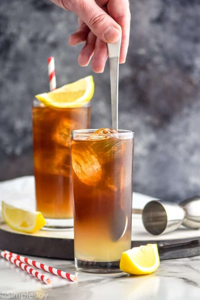 https://www.simplejoy.com/wp-content/uploads/2021/04/how-to-make-a-long-island-iced-tea-683x1024.jpg
