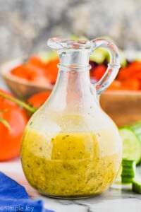 greek salad dressing in a salad dressing container