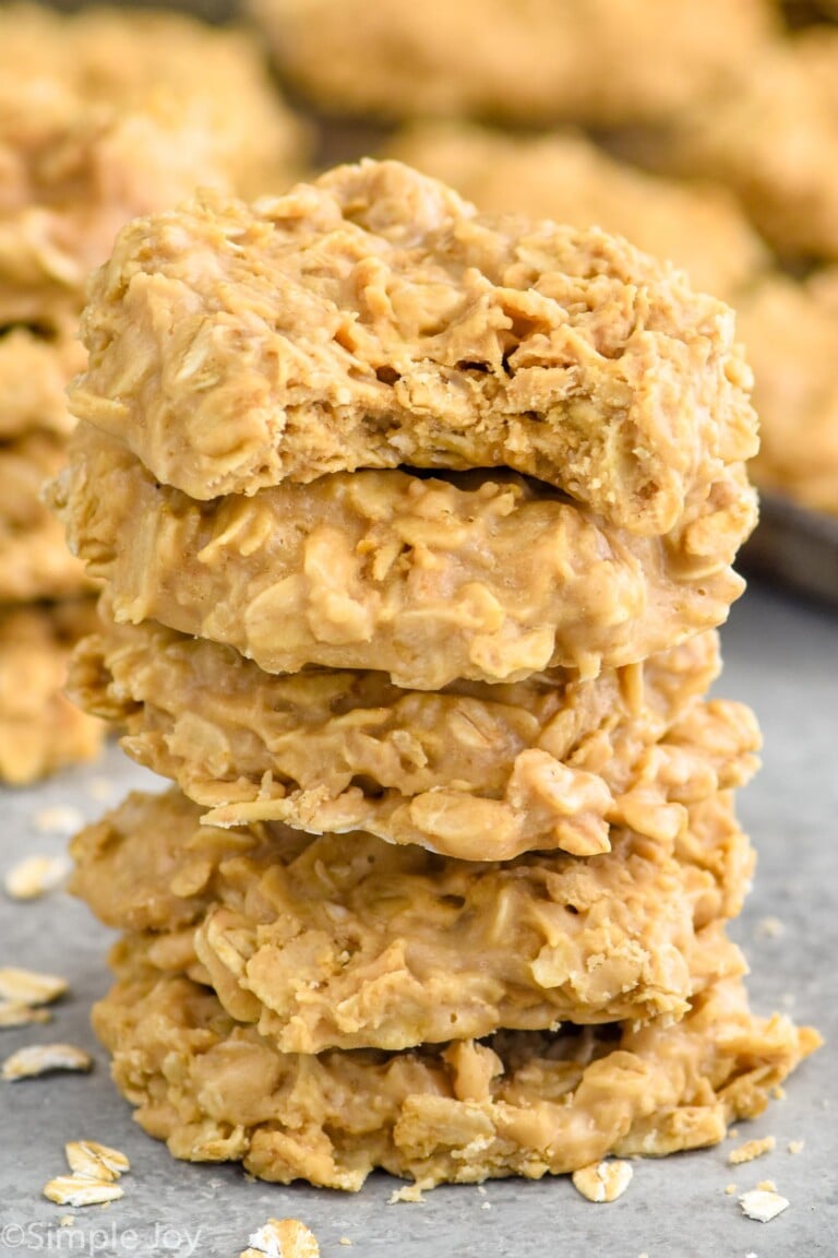 stack of No Bake Biscoff Cookie with no bake biscoff cookies sitting in background