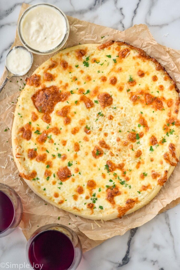 https://www.simplejoy.com/wp-content/uploads/2023/09/pizza-with-white-sauce-683x1024.jpg