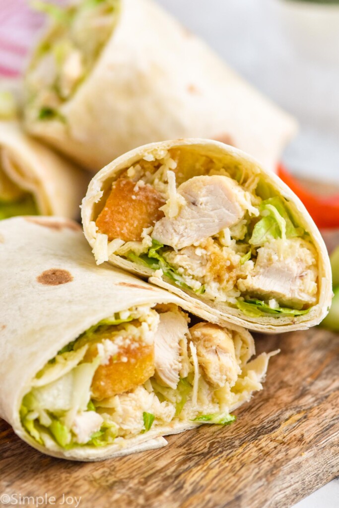 Close up view of a Chicken Caesar Wrap cut in half