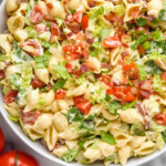 Pinterest graphic for BLT Pasta Salad. Image shows overhead of bowl of BLT Pasta Salad. Text says "the best BLT Pasta Salad simplejoy.com"