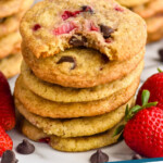 Pinterest graphic for Strawberry Cookies. Photo shows a stack of Strawberry Cookies with chocolate chips and fresh strawberries sitting beside. Text says "Strawberry Cookies simplejoy.com"