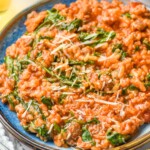 Plate of risotto topped with parmesan cheese