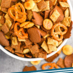 pinterest graphic of overhead view of bowl of homemade Chex mix, says: the best Chex mix simplejoy.com
