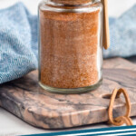 Pinterest graphic for Seasoned Salt. Image shows a jar of Seasoned Salt with a spoon. Text says "Seasoned Salt simplejoy.com"