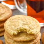 Pinterest graphic for Chai Sugar Cookies. Text says "the best Chai Sugar Cookies simplejoy.com" Image shows stack of Chai Sugar Cookies with cinnamon sticks sitting beside.