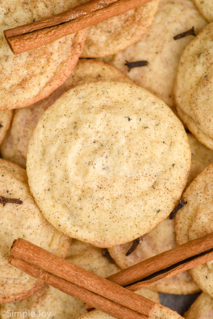 overhead of Chai Sugar Cookies with cinnamon sticks sitting on top