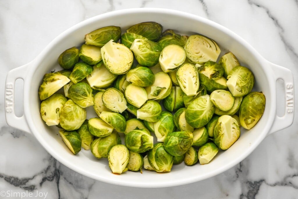 overhead of roasted brussels sprouts in a casserole dish