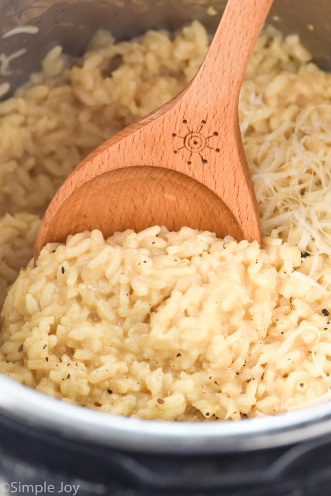 wooden spoon in Instant Pot Risotto