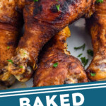 Pinterest graphic for Oven Baked Chicken Legs. Image shows a close up of Oven Baked Chicken Legs. Says "Baked Chicken Legs simplejoy.com"