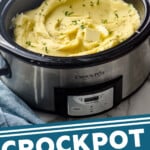 Pinterest graphic for crockpot mashed potatoes. Image shows a crockpot of crockpot mashed potatoes topped with butter and fresh parsley with casserole dish of brussels sprouts casserole sitting in background. Text says "crockpot mashed potatoes simplejoy.com"