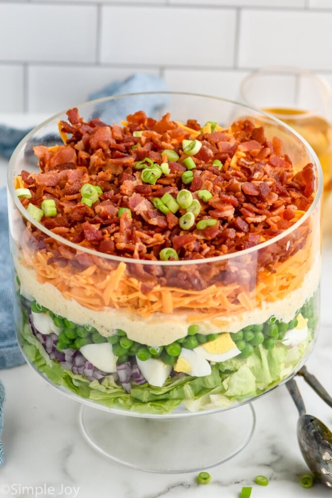 Trifle dish of Seven Layer Salad ingredients