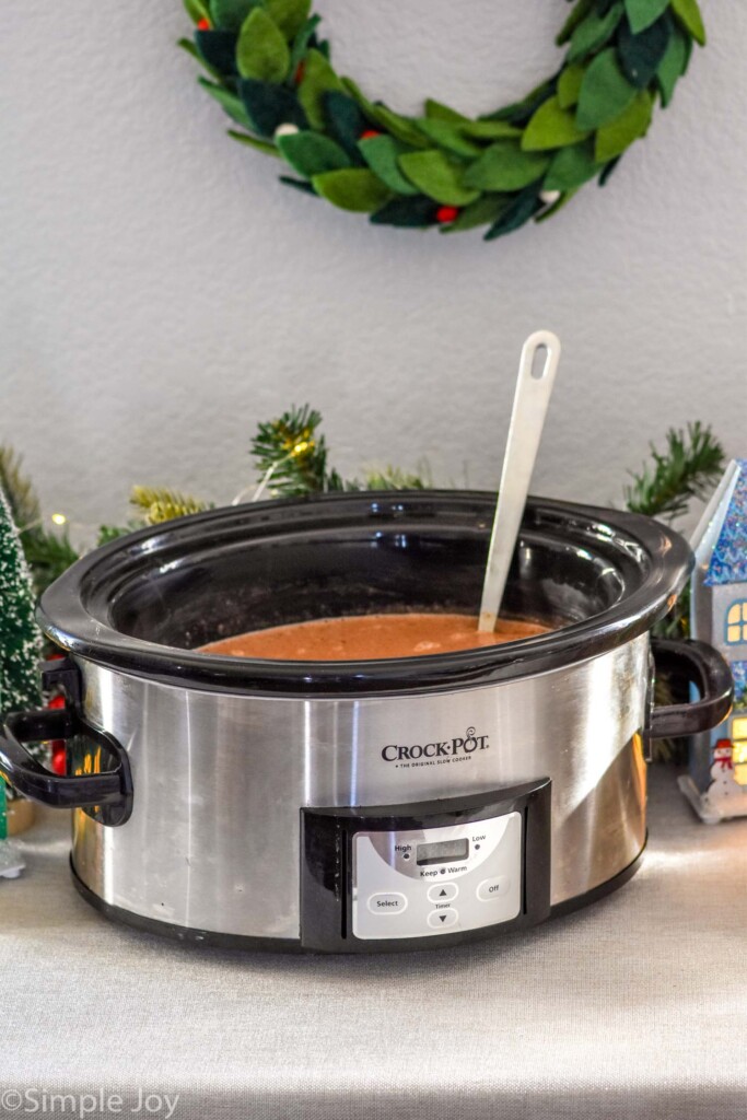 crockpot of hot chocolate with ladle for serving for a Hot Chocolate Bar