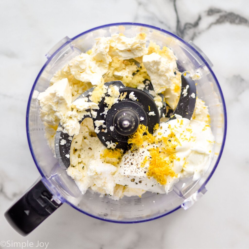 overhead of food processor of Whipped Feta Dip ingredients