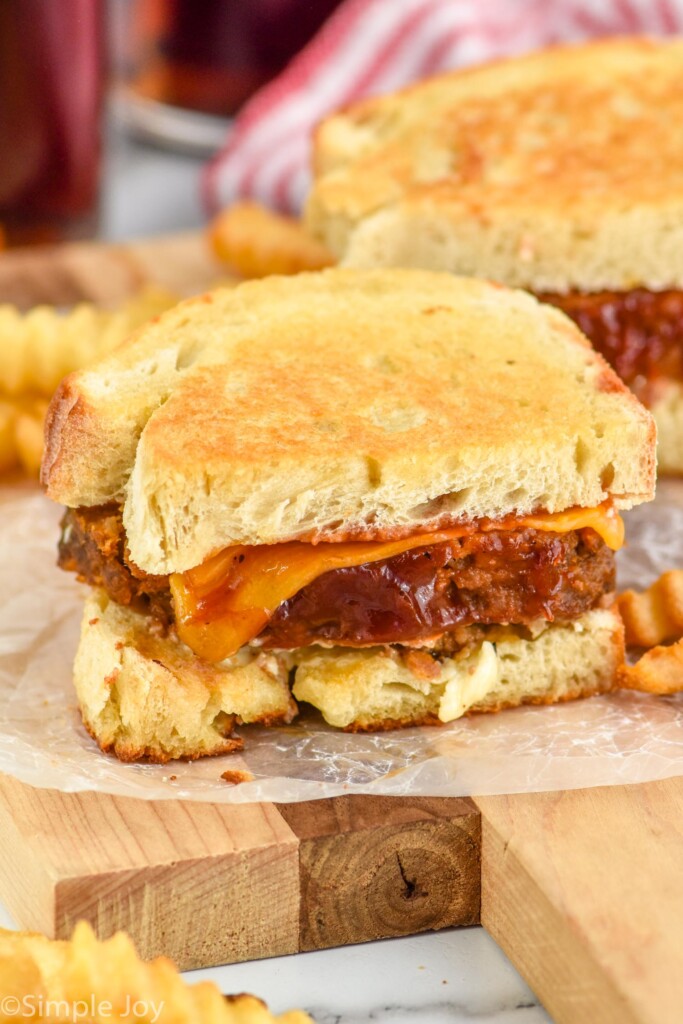 Meatloaf Sandwich with french fries sitting beside