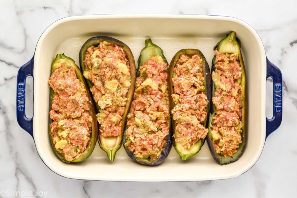 overhead of baking dish of stuffed eggplant