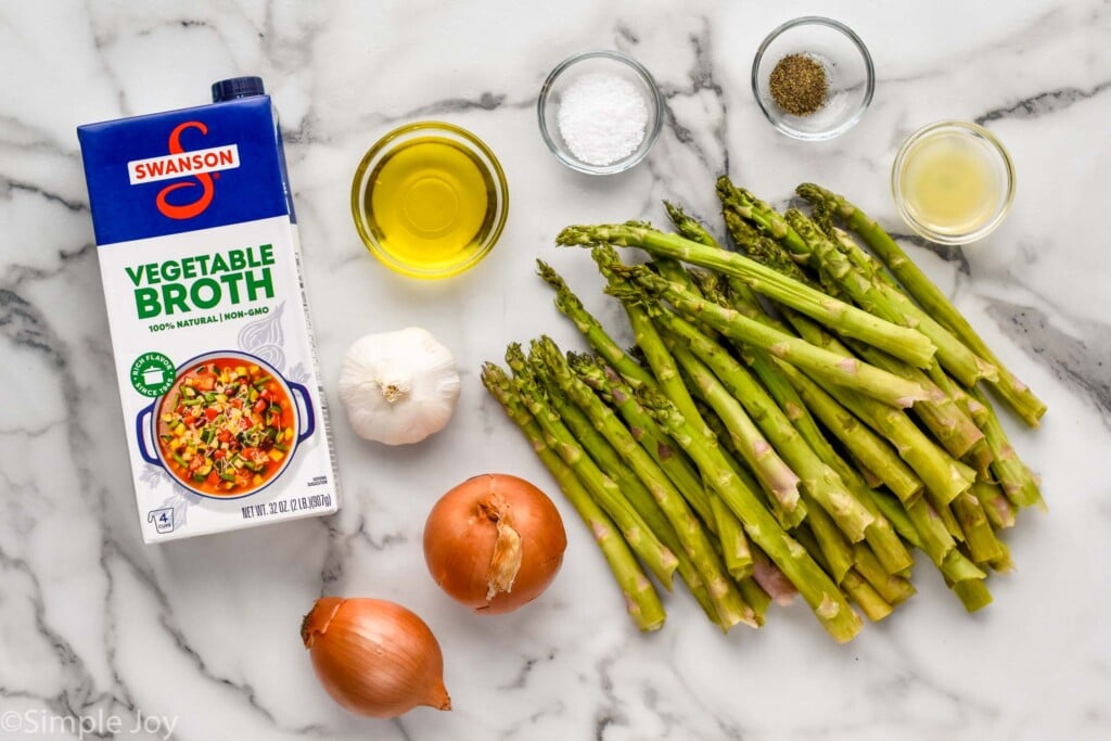 Overhead view of ingredients on countertop for Asparagus Soup recipe.