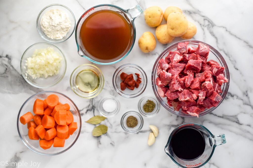 Overhead view of ingredients for Crockpot Beef Stew on the countertop to prepare for recipe.