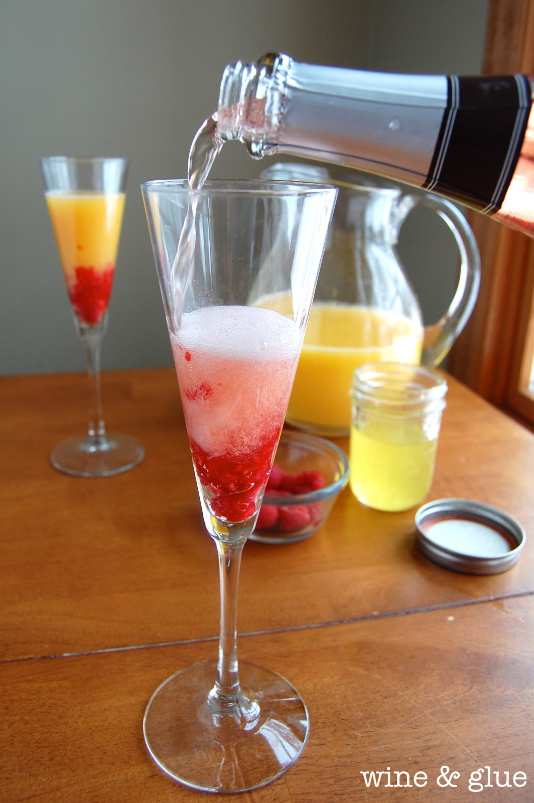 This Sunrise Mimosa cocktail is fruity, beautiful and totally refreshing. Super easy to make and tastes delicious!