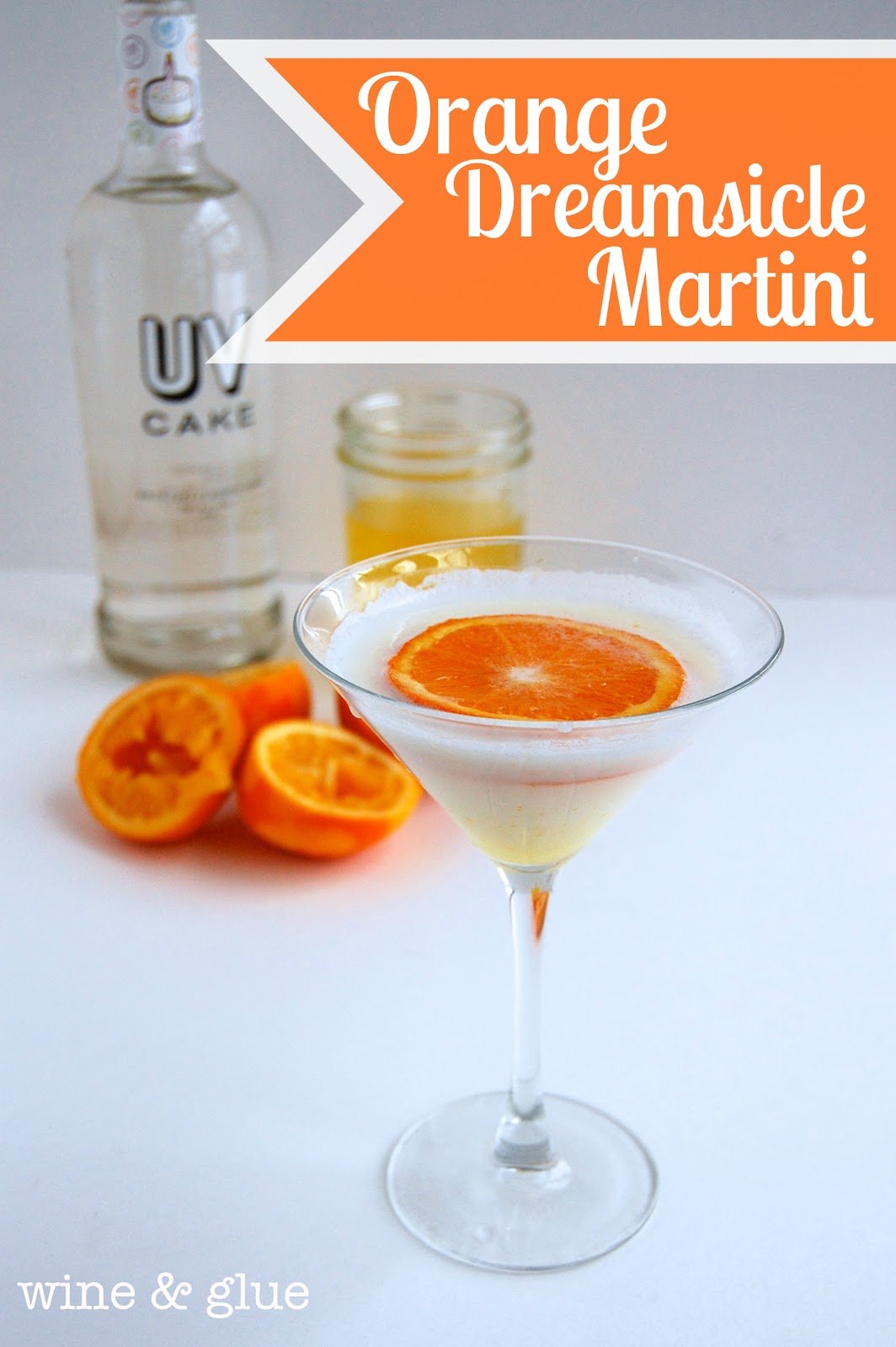 The Orange Dreamsicle taste you loved as a kid all grown up! | Orange Dreamsicle Martini from Wine & Glue #orange #dreamsicle #cake #vodka #cocktail