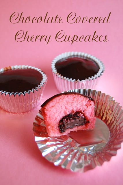 Pink cupcakes with a Dove Chocolate middle filling and melted chocolate topping